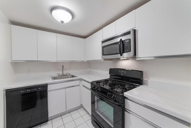 23 Water Grant St Unit 7N, Yonkers, NY 10701 - kitchen featuring black appliances, a sink, light countertops, and white cabinets