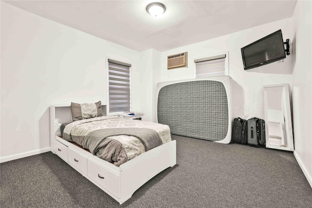 114-11 86th Ave, Richmond Hill North, NY 11418 - bedroom with a wall mounted AC, dark carpet, and baseboards