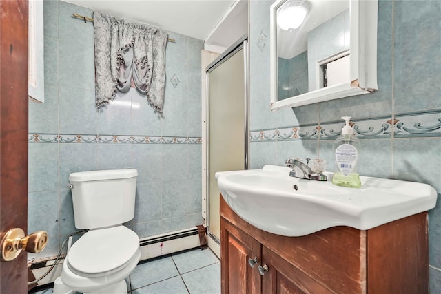 114-11 86th Ave, Richmond Hill North, NY 11418 - bathroom featuring a baseboard heating unit, tile patterned flooring, vanity, toilet, and an enclosed shower
