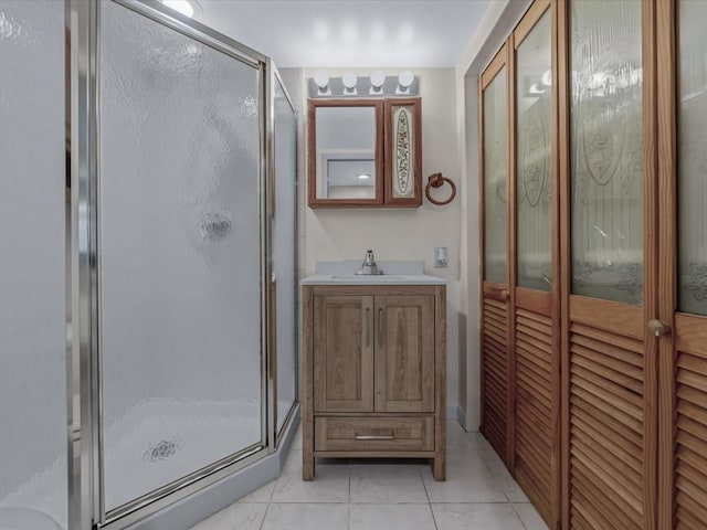 82-44 263rd St, Glen Oaks, NY 11004 - full bathroom featuring a stall shower, vanity, and tile patterned floors