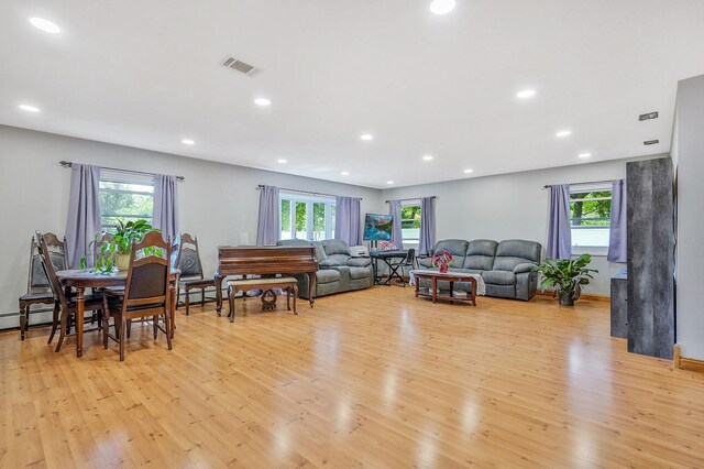 1340 Stony Brook Rd, Stony Brook, NY 11790 - living area with light wood finished floors, healthy amount of natural light, and recessed lighting