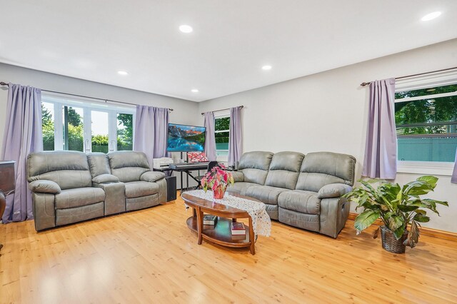 1340 Stony Brook Rd, Stony Brook, NY 11790 - living room with wood finished floors, plenty of natural light, and recessed lighting