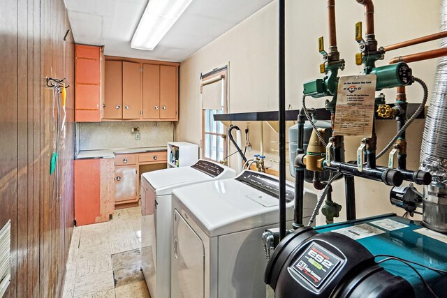 1340 Stony Brook Rd, Stony Brook, NY 11790 - washroom featuring cabinet space and independent washer and dryer
