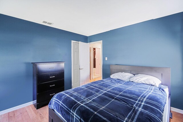 1340 Stony Brook Rd, Stony Brook, NY 11790 - bedroom featuring baseboards and wood finished floors