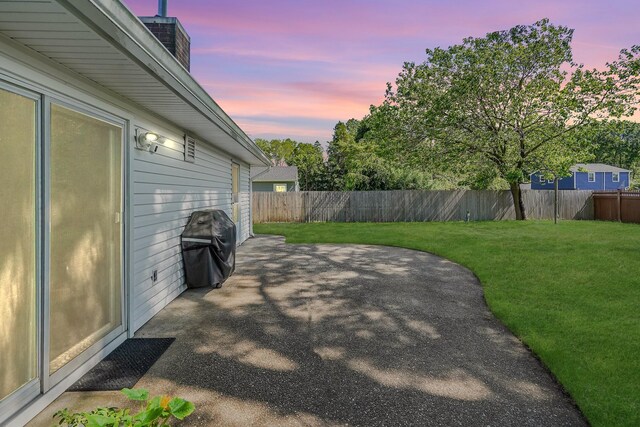 1340 Stony Brook Rd, Stony Brook, NY 11790 - fenced backyard featuring a patio area and area for grilling