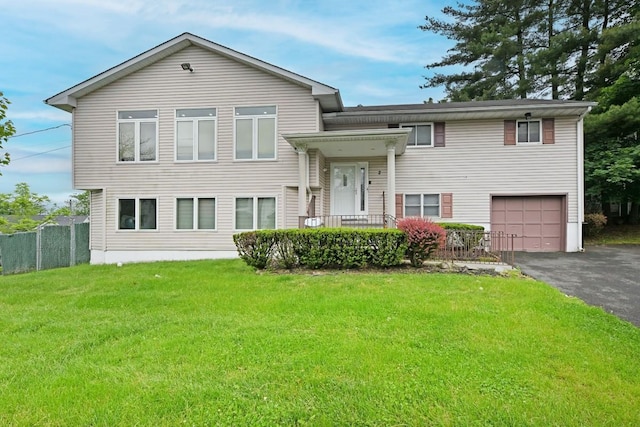 2 Elener Ln, Spring Valley, NY 10977 - split level home featuring an attached garage and asphalt driveway