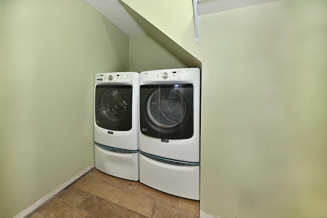 2 Elener Ln, Spring Valley, NY 10977 - laundry room with washer and clothes dryer and baseboards
