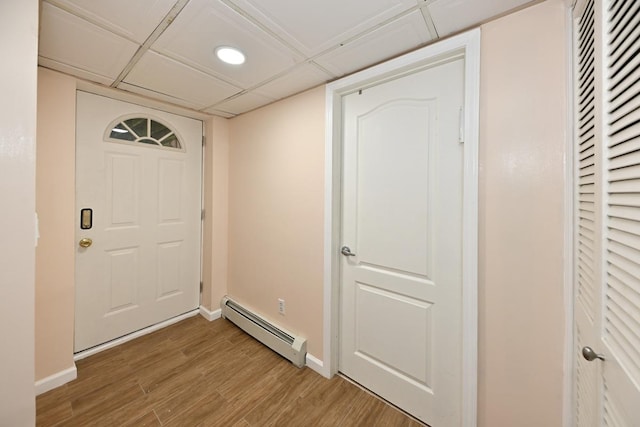 2 Elener Ln, Spring Valley, NY 10977 - foyer entrance featuring a baseboard heating unit, light wood-type flooring, baseboards, and recessed lighting