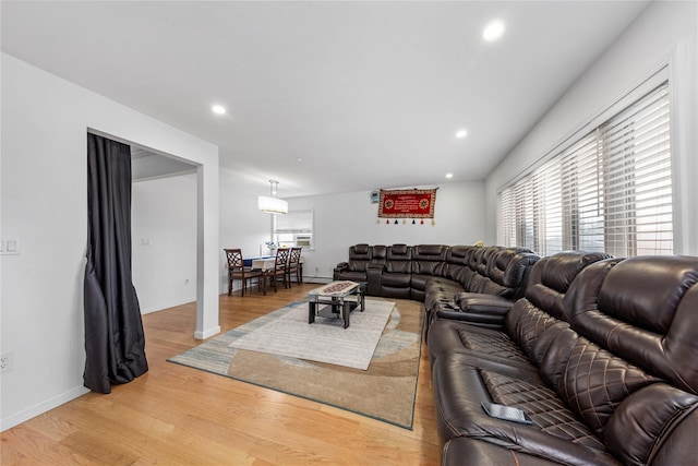 628 151st St, Whitestone, NY 11357 - living area featuring light wood finished floors, recessed lighting, and baseboards