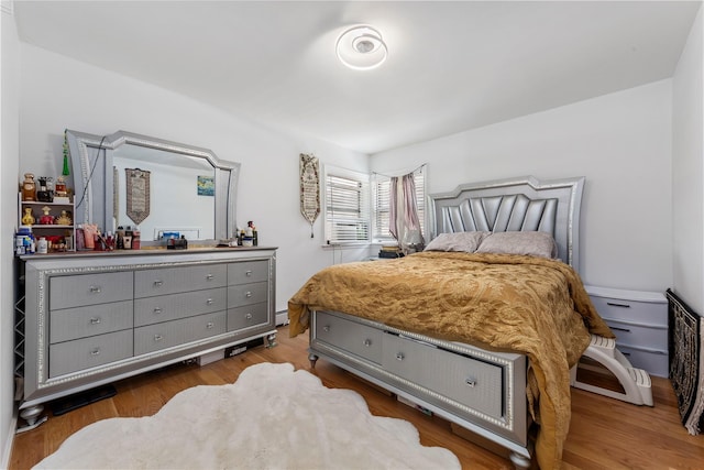 628 151st St, Whitestone, NY 11357 - bedroom featuring wood finished floors