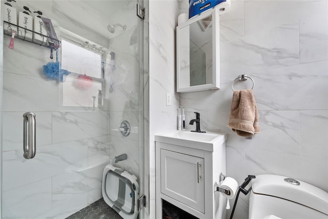 628 151st St, Whitestone, NY 11357 - full bathroom featuring toilet, a marble finish shower, vanity, and tile walls