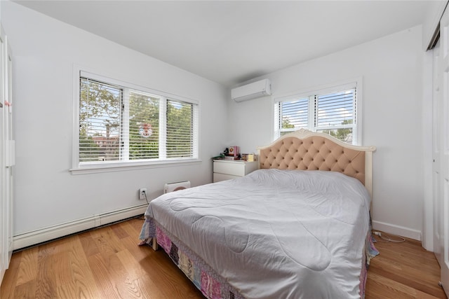 628 151st St, Whitestone, NY 11357 - bedroom with an AC wall unit, a baseboard heating unit, multiple windows, and light wood-type flooring