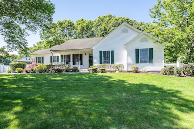 67 Fairway Dr, Wading River, NY 11792 - ranch-style home featuring covered porch and a front yard