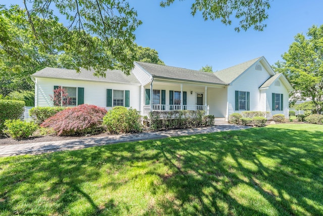 67 Fairway Dr, Wading River, NY 11792 - ranch-style house featuring a porch and a front lawn