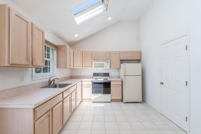 67 Fairway Dr, Wading River, NY 11792 - kitchen with white appliances, light brown cabinetry, a sink, light countertops, and recessed lighting