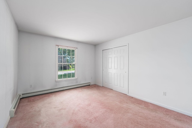 67 Fairway Dr, Wading River, NY 11792 - unfurnished bedroom with carpet floors, baseboards, and a closet