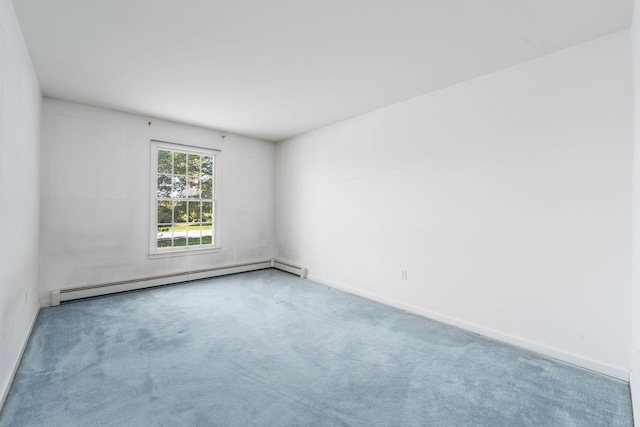 67 Fairway Dr, Wading River, NY 11792 - spare room featuring a baseboard heating unit, carpet flooring, and baseboards