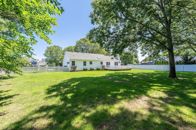 67 Fairway Dr, Wading River, NY 11792 - back of house with a wooden deck