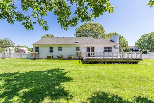 67 Fairway Dr, Wading River, NY 11792 - rear view of house featuring a chimney and a deck