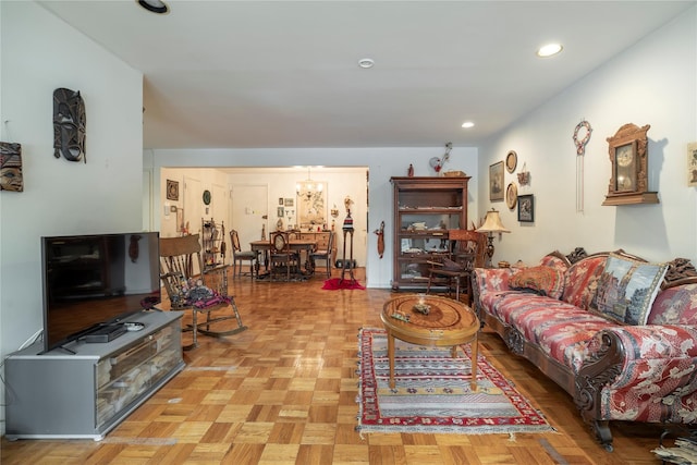 490 Atlantic Ave Unit 103, East Rockaway, NY 11518 - living area with recessed lighting and a chandelier