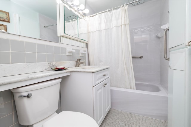 490 Atlantic Ave Unit 103, East Rockaway, NY 11518 - full bathroom featuring toilet, shower / bathtub combination with curtain, vanity, tile patterned floors, and tasteful backsplash