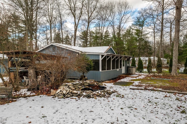 3 Avenue E, Godeffroy, NY 12729 - snow covered property featuring a sunroom