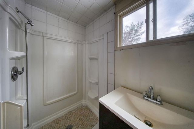 3 Avenue E, Godeffroy, NY 12729 - bathroom featuring a shower, tile patterned flooring, and vanity