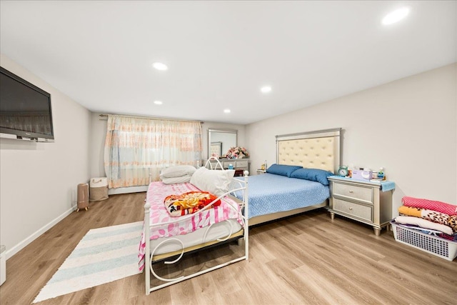 109 Silverleaf Ln, Islandia, NY 11749 - bedroom with wood finished floors, recessed lighting, and baseboards