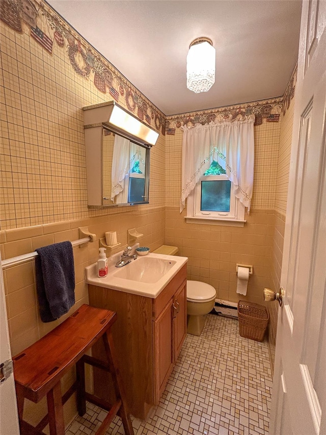 3 Johnston Rd, Livingston Manor, NY 12758 - bathroom featuring vanity, tile walls, and a baseboard heating unit