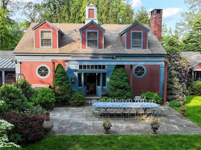 501 Guard Hill Rd, Bedford, NY 10506 - cape cod home with a chimney, a patio, and roof with shingles