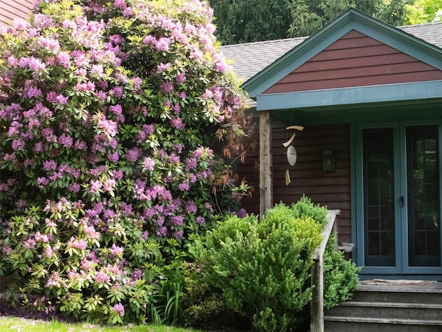 501 Guard Hill Rd, Bedford, NY 10506 - exterior view of french doors and a shingled roof