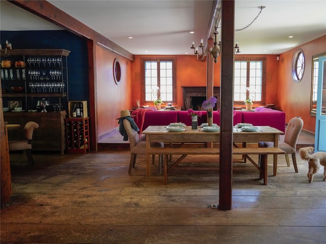 501 Guard Hill Rd, Bedford, NY 10506 - dining room featuring wood-type flooring, healthy amount of natural light, recessed lighting, and a fireplace