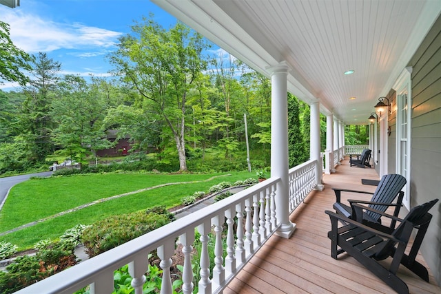 383 Illington Rd, Ossining, NY 10562 - wooden porch with a yard