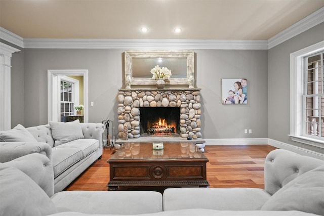 383 Illington Rd, Ossining, NY 10562 - living area featuring a fireplace, wood finished floors, ornamental molding, and recessed lighting