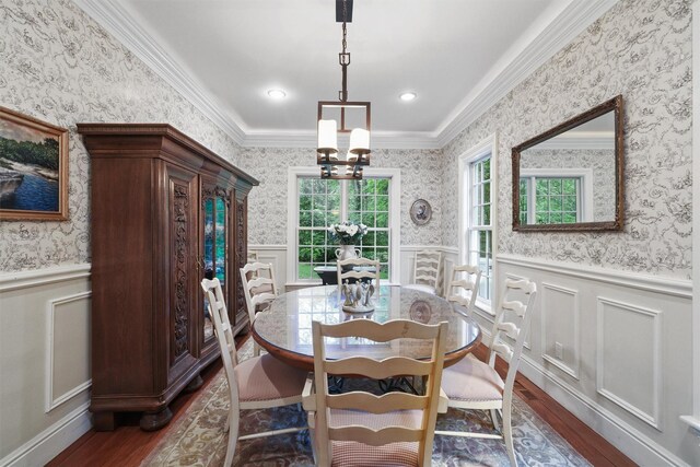 383 Illington Rd, Ossining, NY 10562 - dining area with dark wood-type flooring, wainscoting, crown molding, a decorative wall, and wallpapered walls