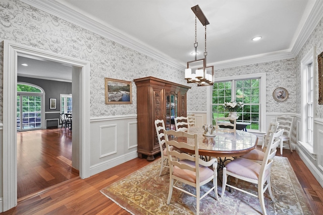 383 Illington Rd, Ossining, NY 10562 - dining space with plenty of natural light, wainscoting, a chandelier, dark wood finished floors, and wallpapered walls