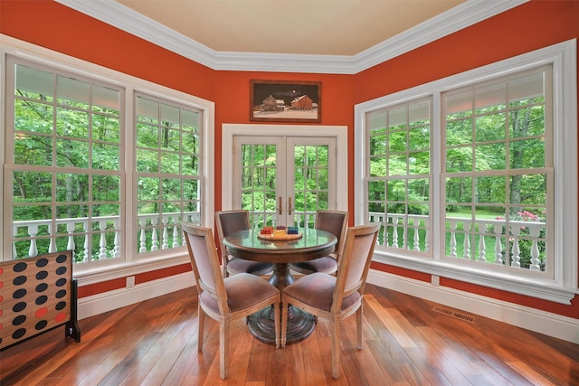 383 Illington Rd, Ossining, NY 10562 - dining room with crown molding, hardwood / wood-style flooring, and french doors