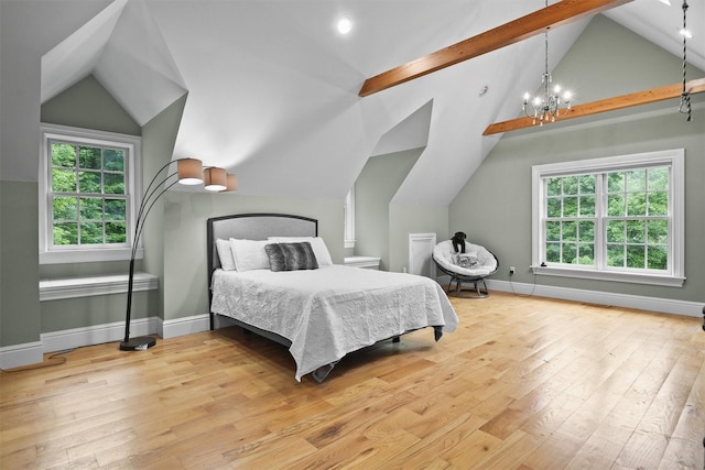 383 Illington Rd, Ossining, NY 10562 - bedroom with hardwood / wood-style flooring and a chandelier
