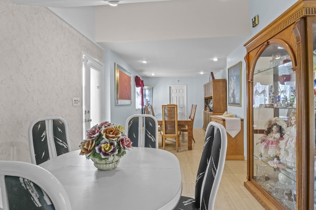 1125 Reilly St, Bay Shore, NY 11706 - dining area with light wood-style flooring and recessed lighting