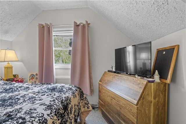 1125 Reilly St, Bay Shore, NY 11706 - bedroom featuring vaulted ceiling and a textured ceiling