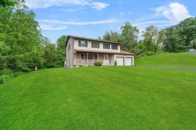 14 Cheesecote Ct, Stony Point, NY 10980 - view of front of property featuring a porch, a front yard, an attached garage, driveway, and brick siding