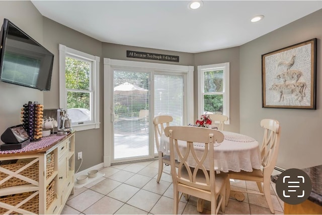10 Woods Edge Ct, Hauppauge, NY 11788 - dining area featuring baseboards, light tile patterned floors, recessed lighting, and baseboard heating