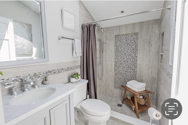 10 Woods Edge Ct, Hauppauge, NY 11788 - bathroom with toilet, a tile shower, vanity, and tile walls