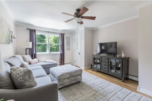 10 Woods Edge Ct, Hauppauge, NY 11788 - living room with wood finished floors, a baseboard heating unit, a ceiling fan, crown molding, and baseboards