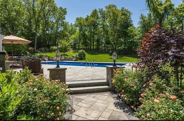 10 Woods Edge Ct, Hauppauge, NY 11788 - outdoor pool with a patio