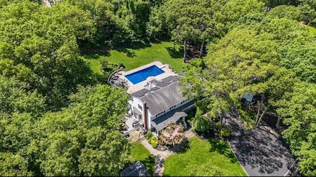 10 Woods Edge Ct, Hauppauge, NY 11788 - aerial view of property and surrounding area with a pool and a forest