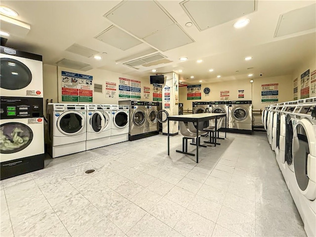 40 Brighton 1st Rd Unit 12H, Brooklyn, NY 11235 - community laundry featuring separate washer and dryer, estacked washer and dryer, and recessed lighting