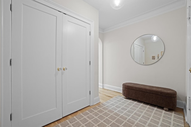 295 N Broadway Unit 27, Yonkers, NY 10701 - sitting room with crown molding, baseboards, and wood finished floors