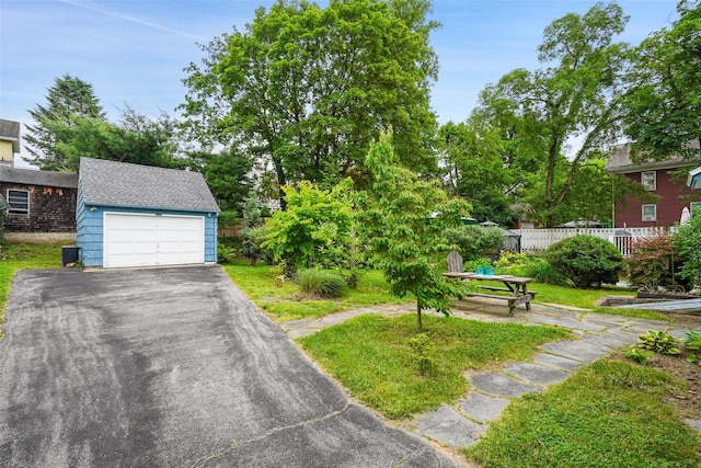 329 Simpson Pl, Peekskill, NY 10566 - view of yard featuring an outbuilding and asphalt driveway