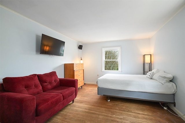 329 Simpson Pl, Peekskill, NY 10566 - bedroom featuring wood finished floors and crown molding